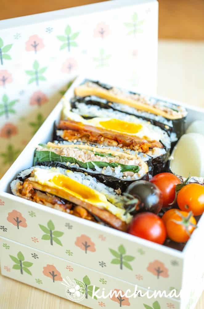 folded kimbap sandwiches in lunch box